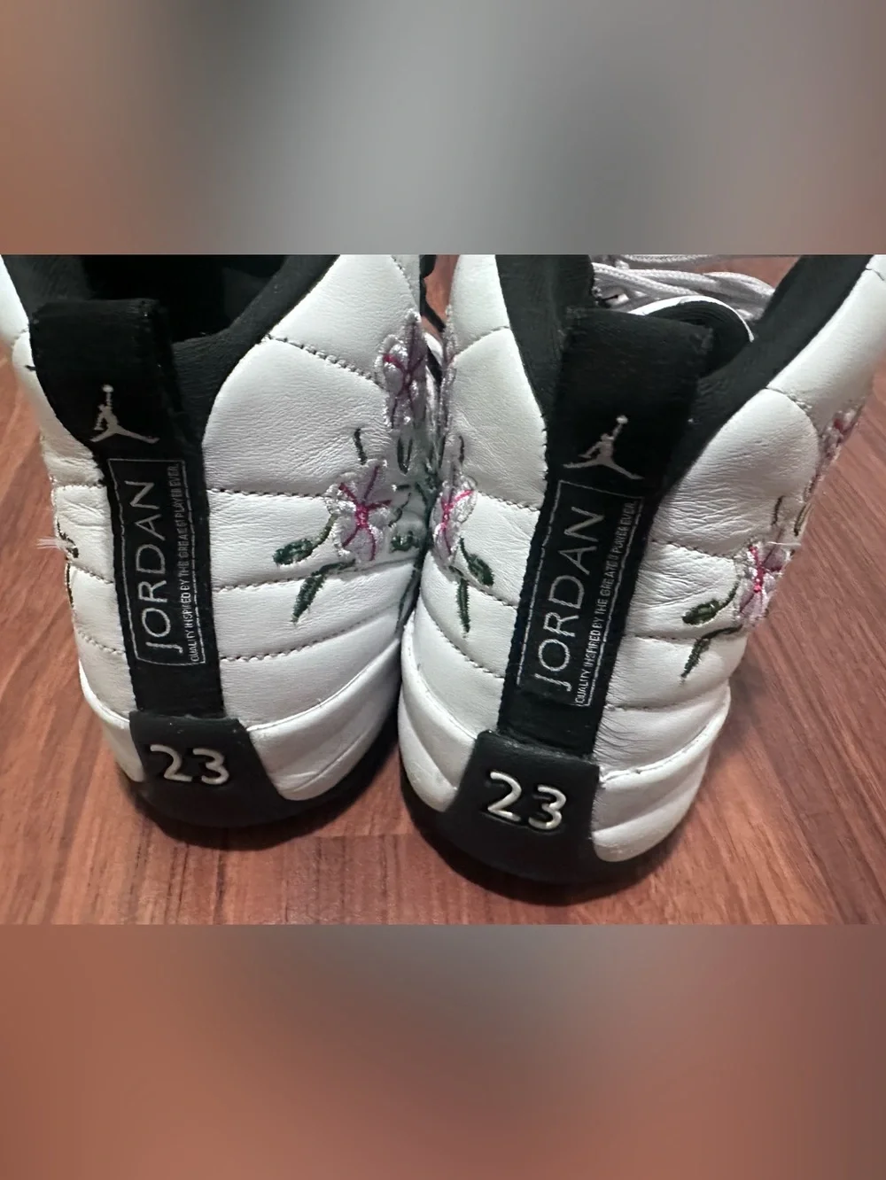 Jordan High-Top Sneakers in White and Black. Size 6.5 youth.